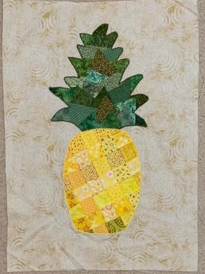 Pineapple collage with fabric woven body, appliqued to background, work in progress